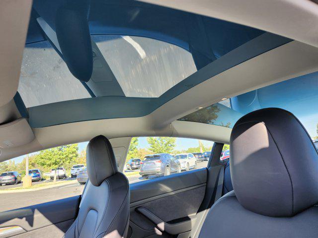 Photo of 2023 Pearl White Multi-Coat Tesla Model 3
