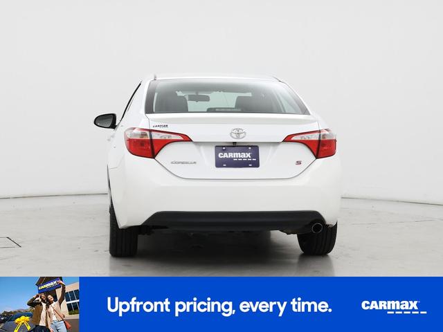 Photo of 2015 White Toyota Corolla