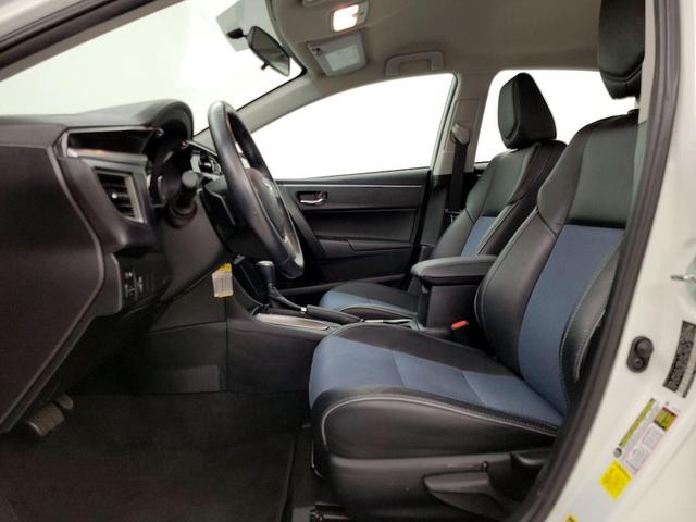Photo of 2015 White Toyota Corolla