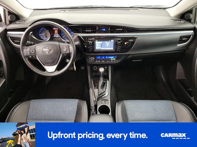 Photo of 2015 White Toyota Corolla