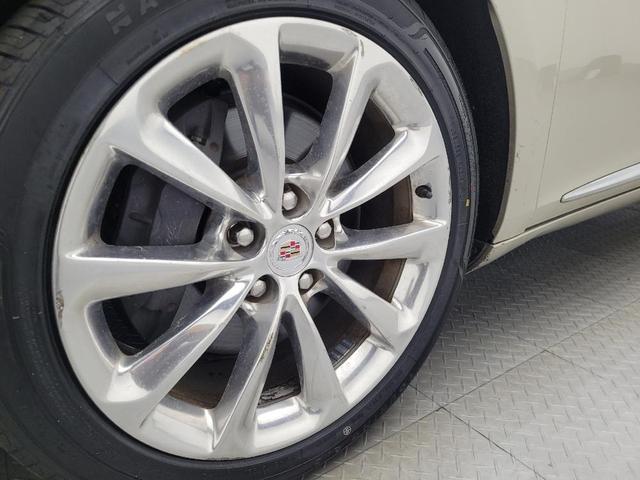 Photo of 2014 Gold Cadillac XTS