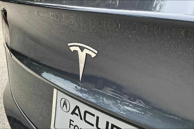 Photo of 2018 Pearl White Multi Tesla Model 3