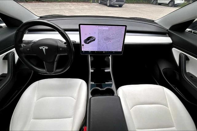 Photo of 2018 Pearl White Multi Tesla Model 3