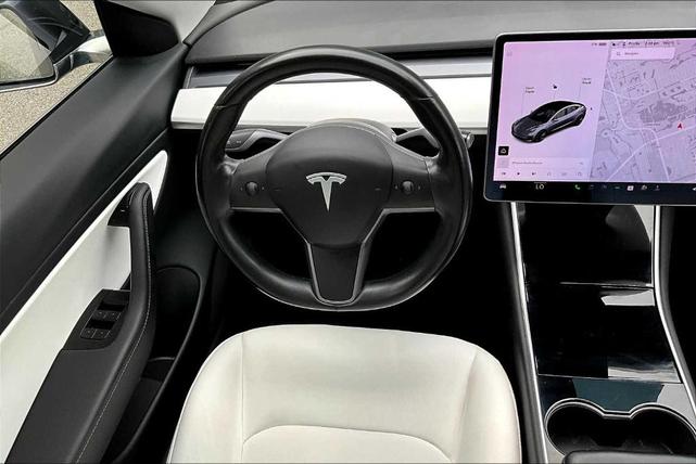 Photo of 2018 Pearl White Multi Tesla Model 3