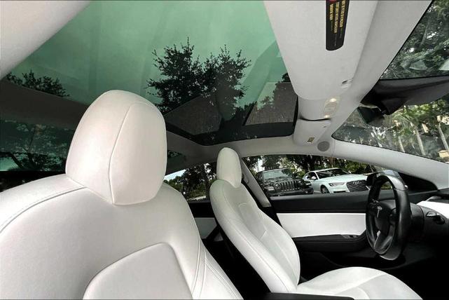 Photo of 2018 Pearl White Multi Tesla Model 3