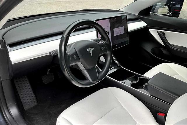 Photo of 2018 Pearl White Multi Tesla Model 3