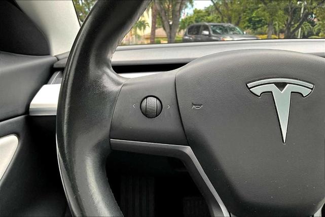 Photo of 2018 Pearl White Multi Tesla Model 3