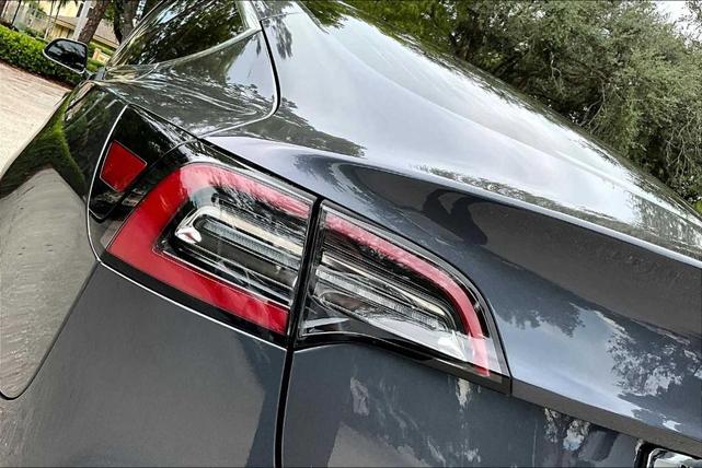 Photo of 2018 Pearl White Multi Tesla Model 3