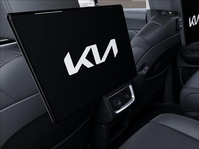 Photo of 2025 Ivory Silver Kia Carnival Hybrid