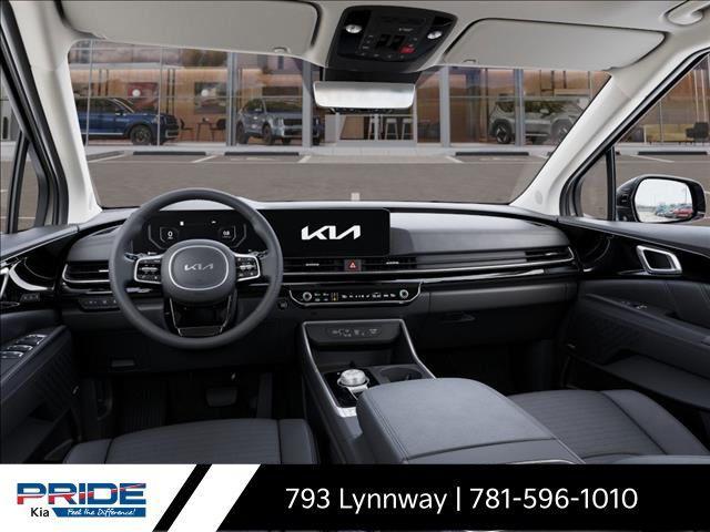 Photo of 2025 Ivory Silver Kia Carnival Hybrid