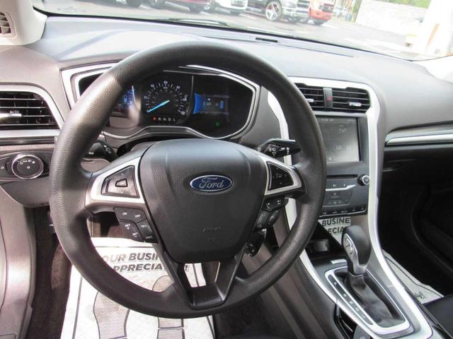 Photo of 2014 Silver Ford Fusion Hybrid