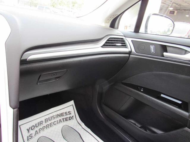 Photo of 2014 Silver Ford Fusion Hybrid
