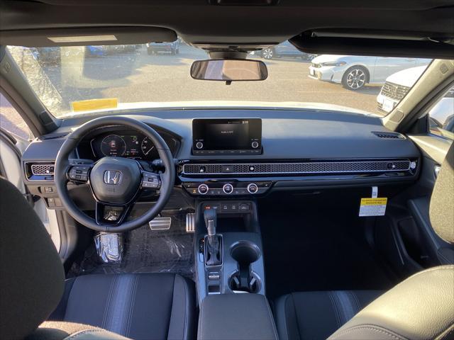 Photo of 2025 Platinum White Pearl Honda Civic Hybrid