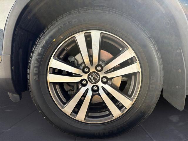 Photo of 2016 Black Forest Pearl Honda Pilot