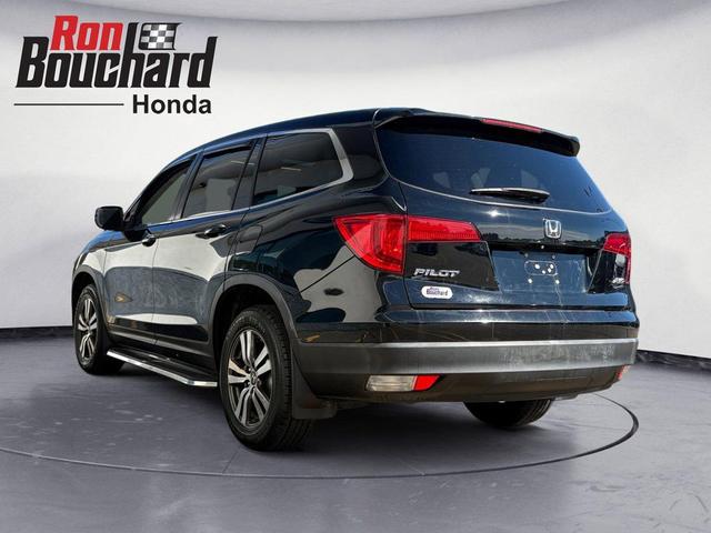 Photo of 2016 Black Forest Pearl Honda Pilot