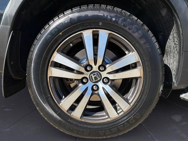 Photo of 2016 Black Forest Pearl Honda Pilot