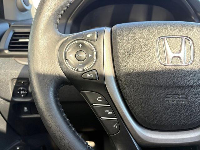 Photo of 2016 Black Forest Pearl Honda Pilot
