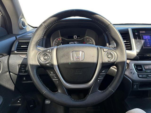 Photo of 2016 Black Forest Pearl Honda Pilot
