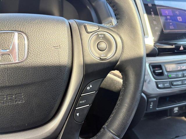 Photo of 2016 Black Forest Pearl Honda Pilot
