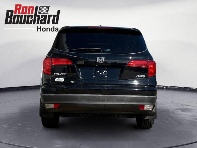 Photo of 2016 Black Forest Pearl Honda Pilot