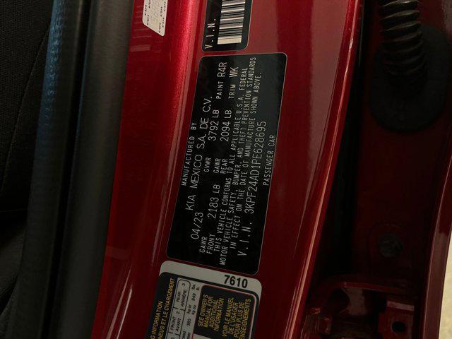 Photo of 2023 Currant Red Kia Forte