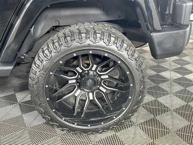 Photo of 2014 Black Clearcoat Jeep Wrangler Unlimited