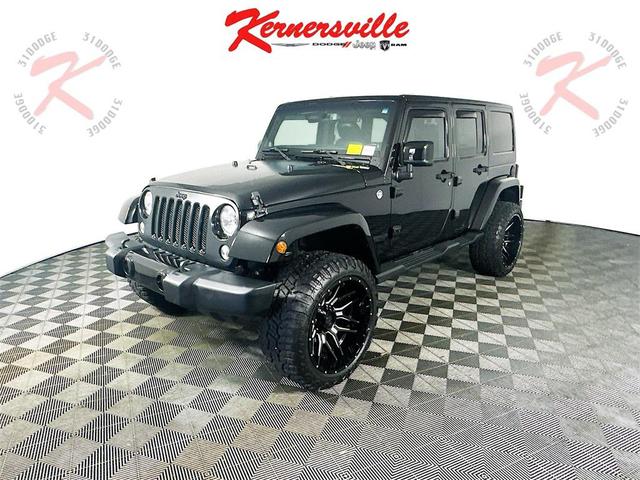 Photo of 2014 Black Clearcoat Jeep Wrangler Unlimited