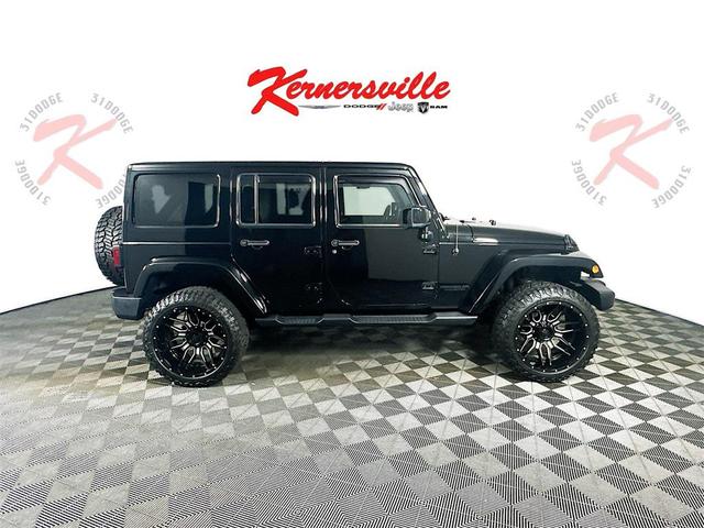 Photo of 2014 Black Clearcoat Jeep Wrangler Unlimited