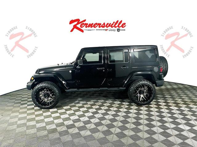 Photo of 2014 Black Clearcoat Jeep Wrangler Unlimited
