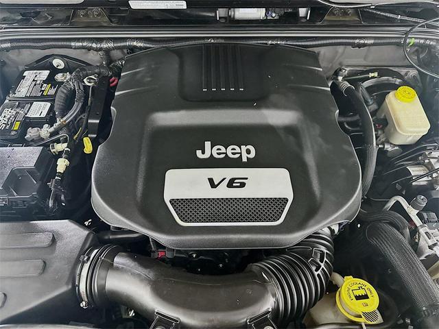 Photo of 2014 Black Clearcoat Jeep Wrangler Unlimited