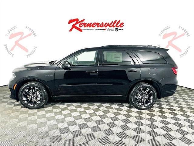 Photo of 2025 DB Black Clearcoat Dodge Durango