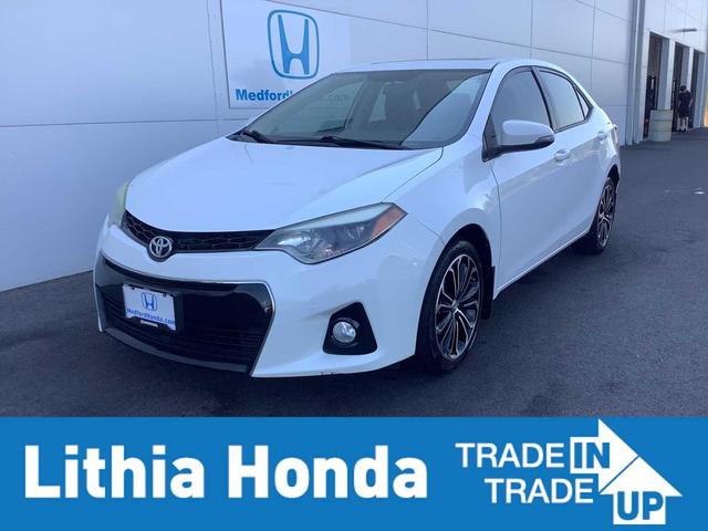 Photo of 2014 Super White Toyota Corolla