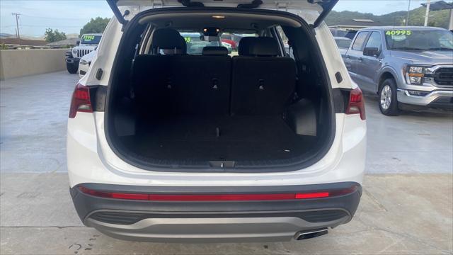 Photo of 2023 Serenity White Pearl Hyundai SANTA FE