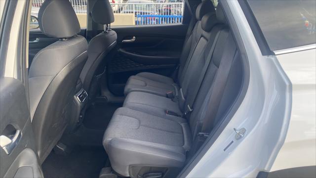Photo of 2023 Serenity White Pearl Hyundai SANTA FE