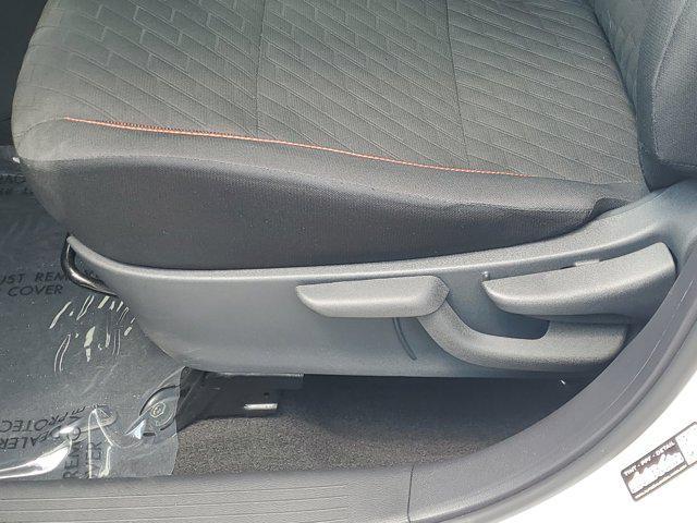 Photo of 2024 Aspen White Tricoat/Super Black Nissan Kicks