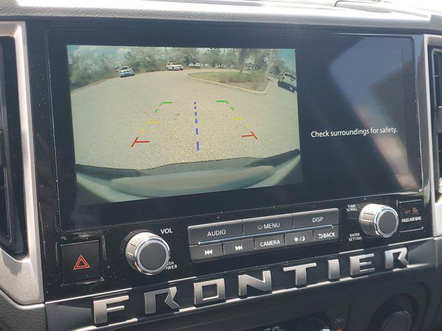 Photo of 2025 Glacier White Nissan Frontier