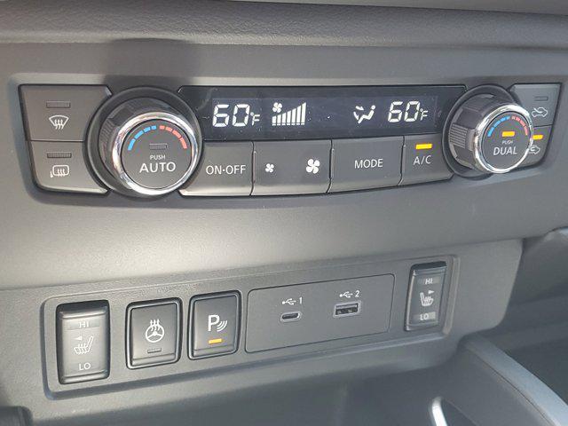 Photo of 2025 Glacier White Nissan Frontier