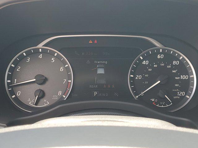 Photo of 2025 Glacier White Nissan Frontier