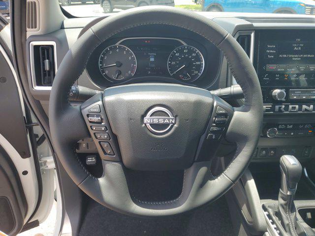 Photo of 2025 Glacier White Nissan Frontier
