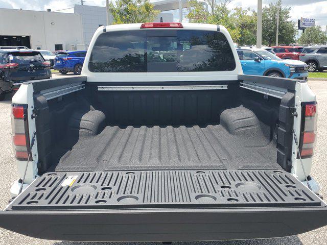 Photo of 2025 Glacier White Nissan Frontier
