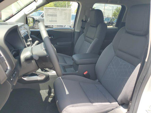 Photo of 2025 Glacier White Nissan Frontier