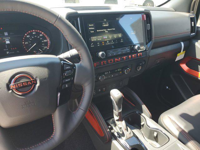 Photo of 2025 Glacier White Nissan Frontier