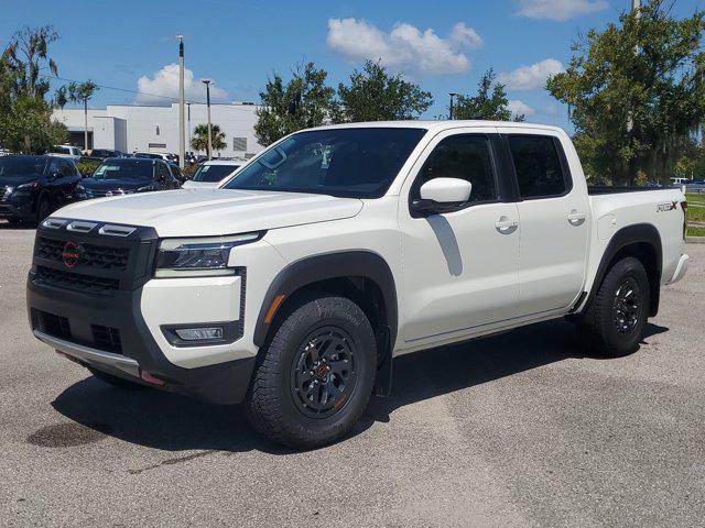 Photo of 2025 Glacier White Nissan Frontier