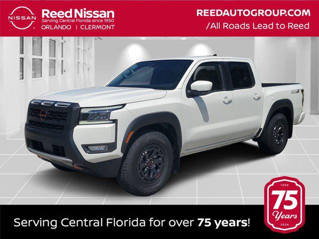 Photo of 2025 Glacier White Nissan Frontier