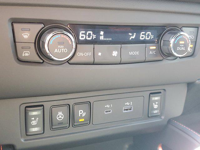 Photo of 2025 Glacier White Nissan Frontier
