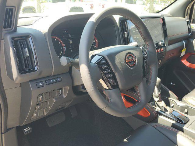 Photo of 2025 Glacier White Nissan Frontier