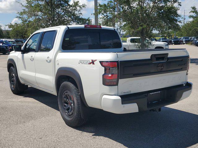 Photo of 2025 Glacier White Nissan Frontier