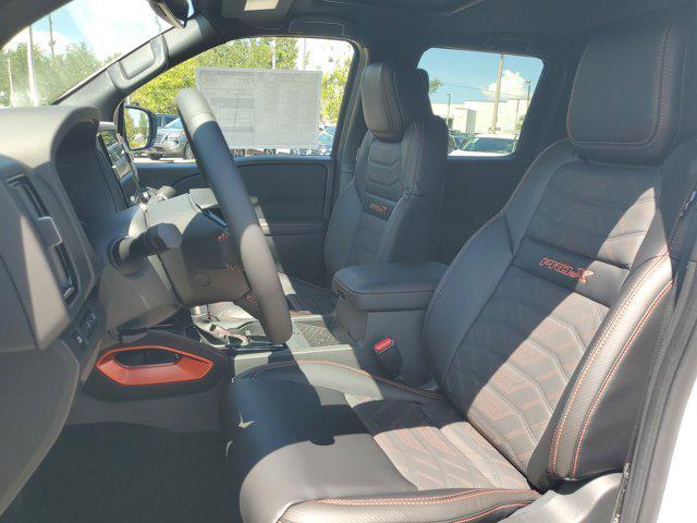 Photo of 2025 Glacier White Nissan Frontier