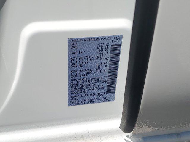 Photo of 2025 Glacier White Nissan Frontier