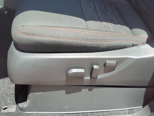 Photo of 2025 Afterburn Orange Nissan Frontier